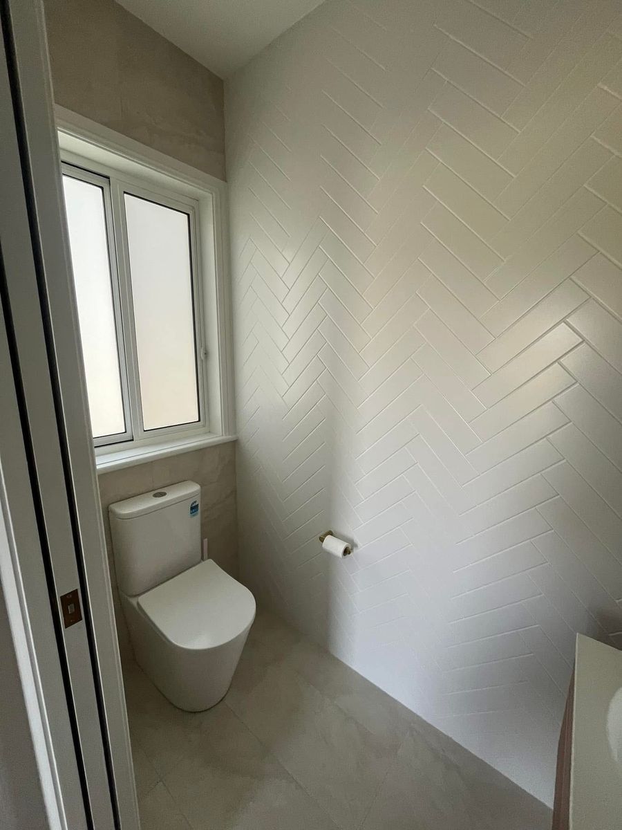 Vanity herringbone wall